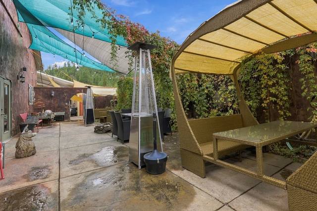 Side patio with heaters